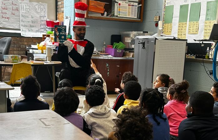  Dr. Suess character reading to students